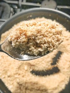 toasted almond flour on a spoon