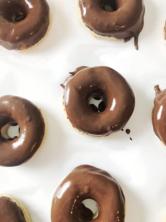 close-up overhead of chocolate glazed donuts