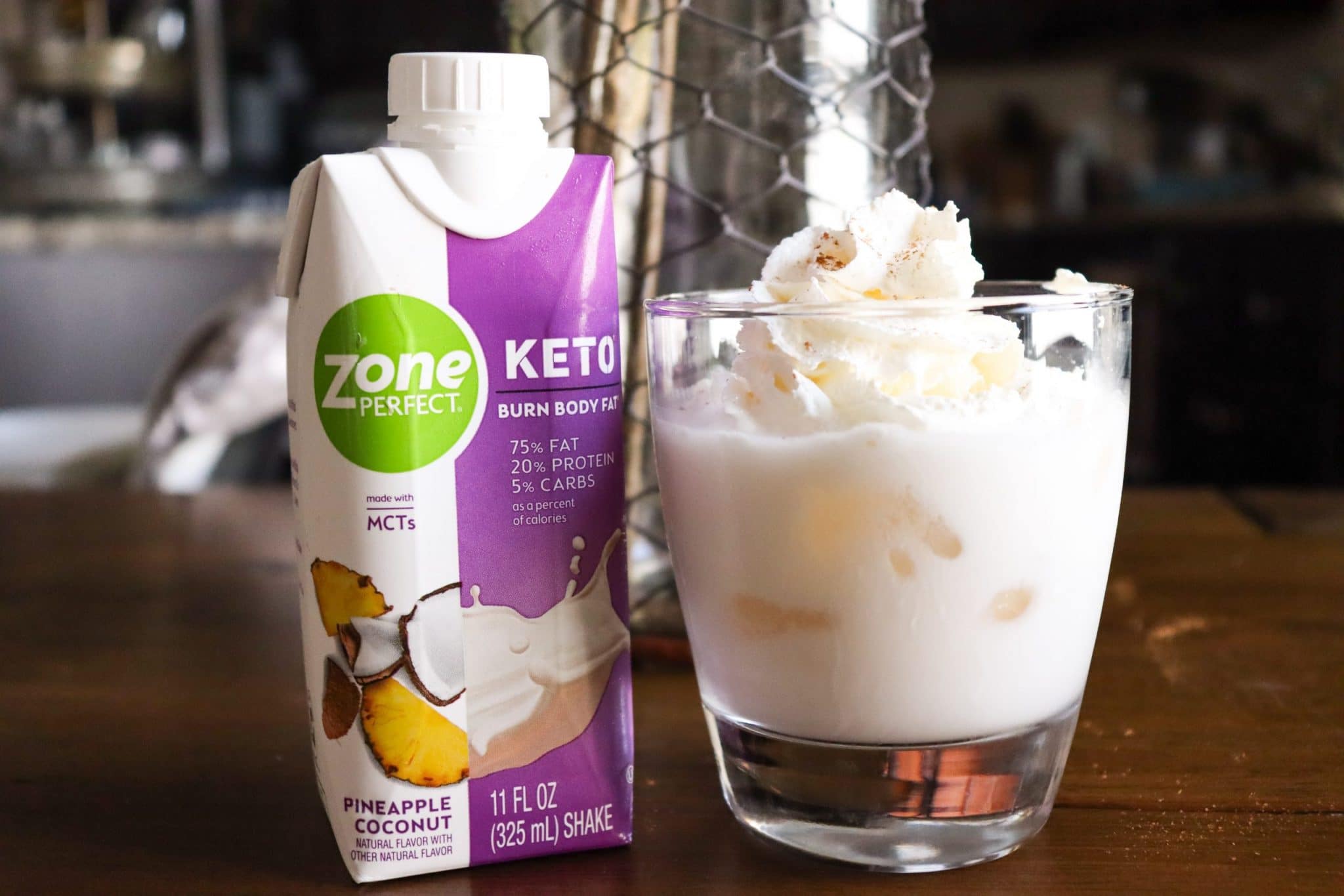 ZonePerfect Keto Shakes glass with shake sugar free whipped cream