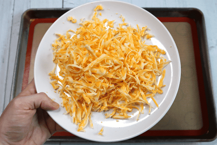 Shredded cheese on a plate