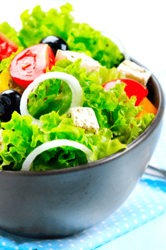 Mediterranean Diet salad with feta cheese and black olives and tomatoes