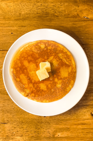 3 ingredient keto pancakes on a white plate