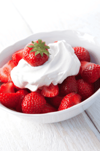 keto whipped cream on strawberries