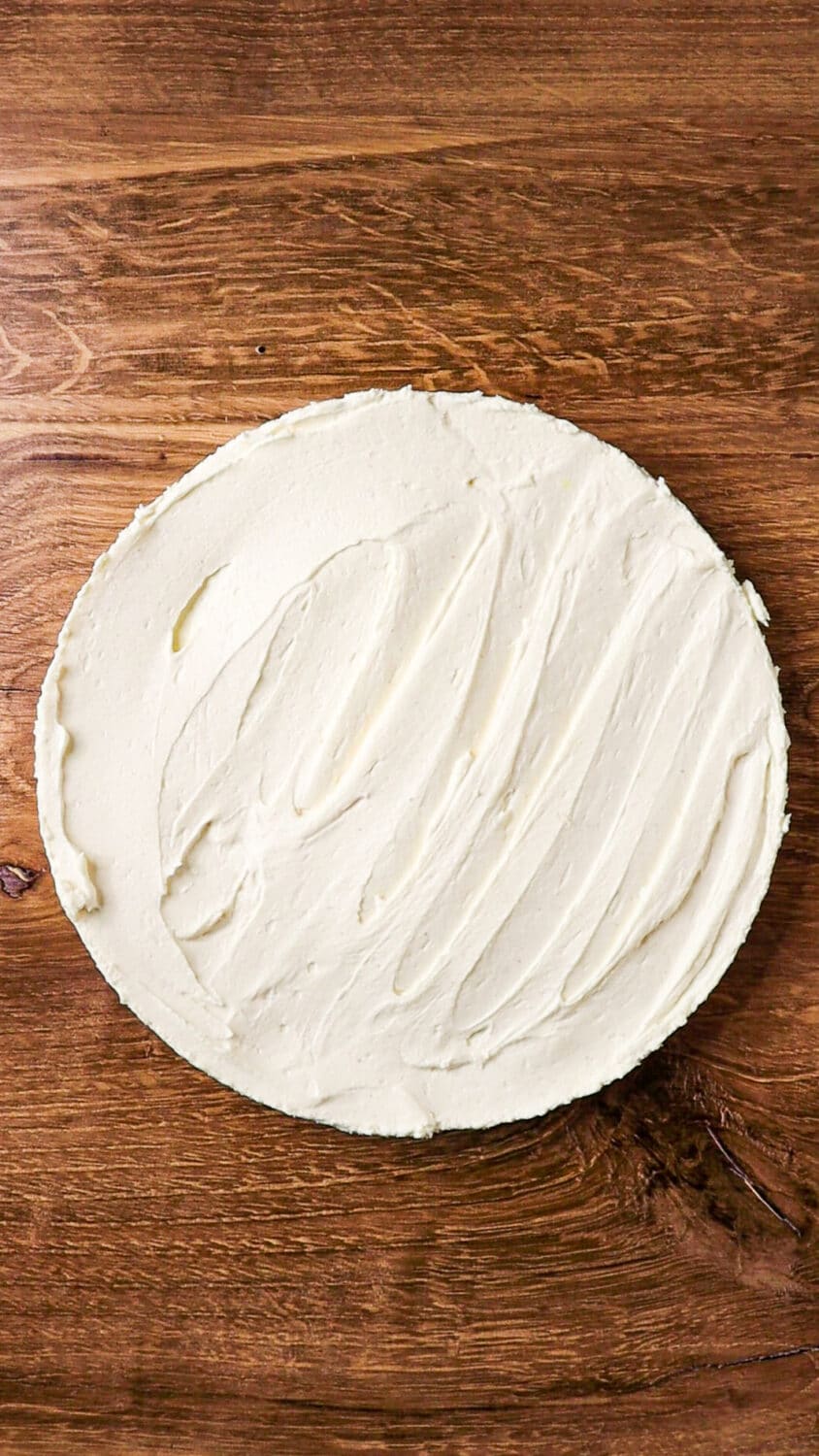 full-size keto no-bake cheesecake on wooden table