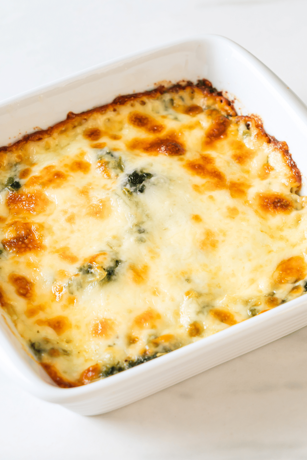 Chicken Spinach and Artichoke Casserole. The delicate blend of spinach, artichoke, and tender chicken make this dish a delicious and satisfying low-carb meal.
