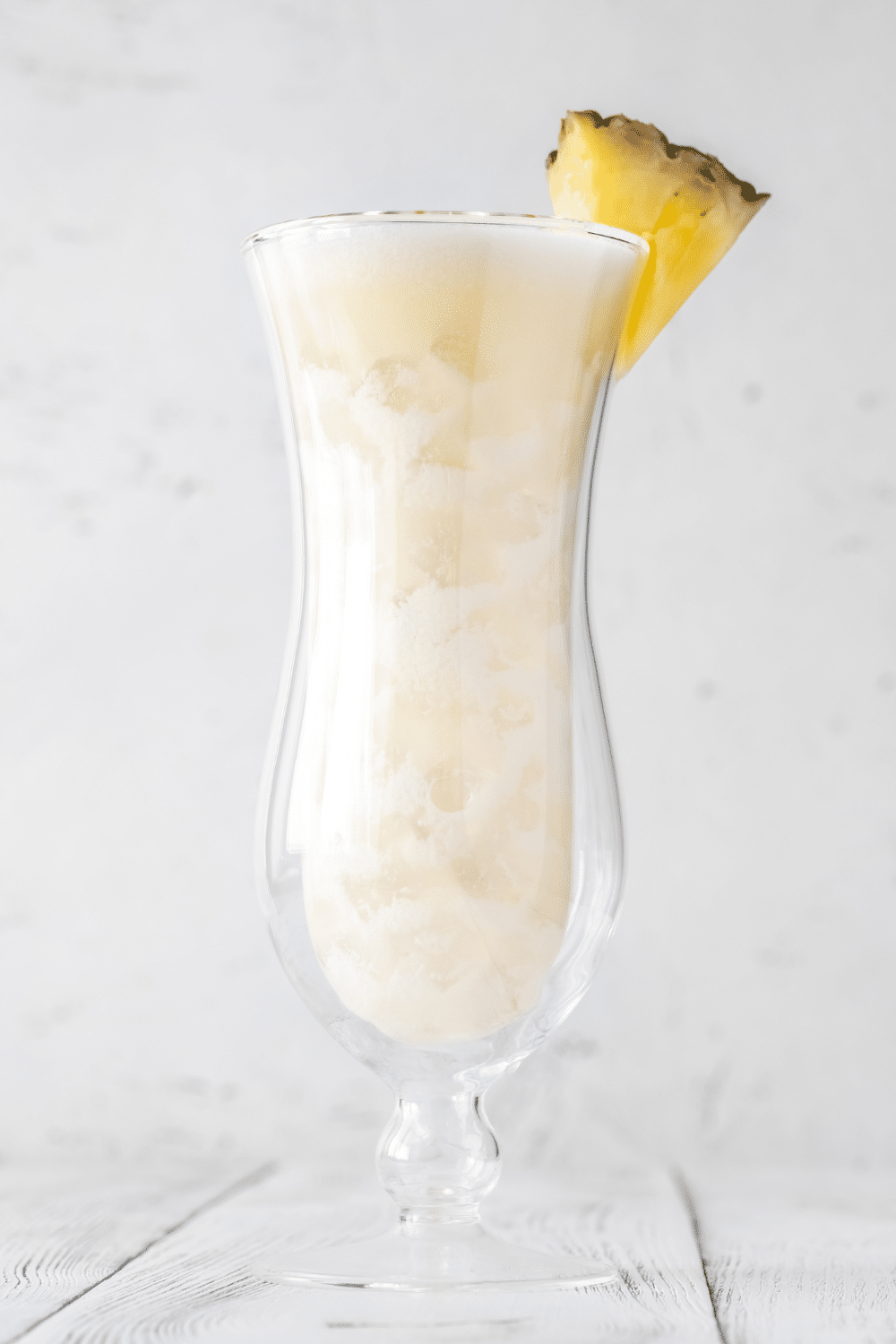 Exotic pina colada with a tropical twist, combining creamy coconut, pineapple juice, and a splash of white rum.