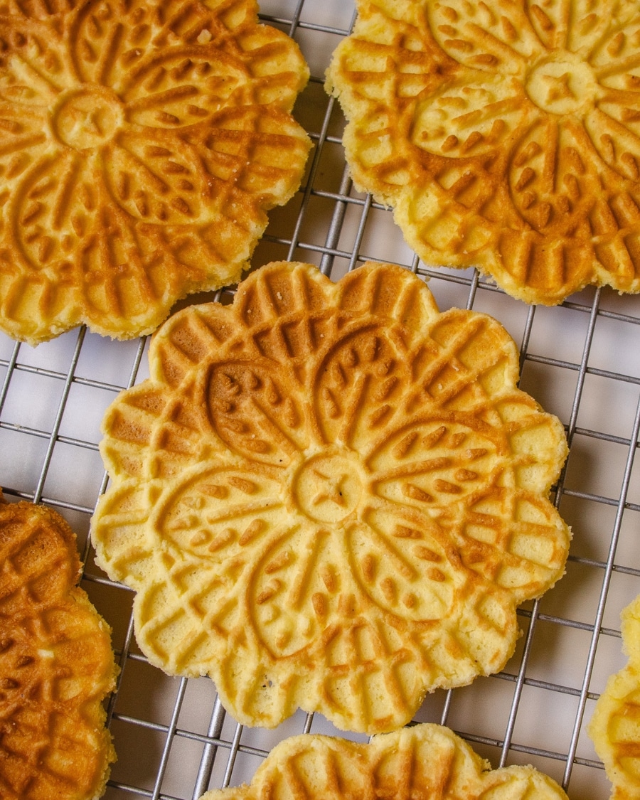 close-up shot of keto pizzelle cookies ready to be dusted with sugar free powdered sweetener