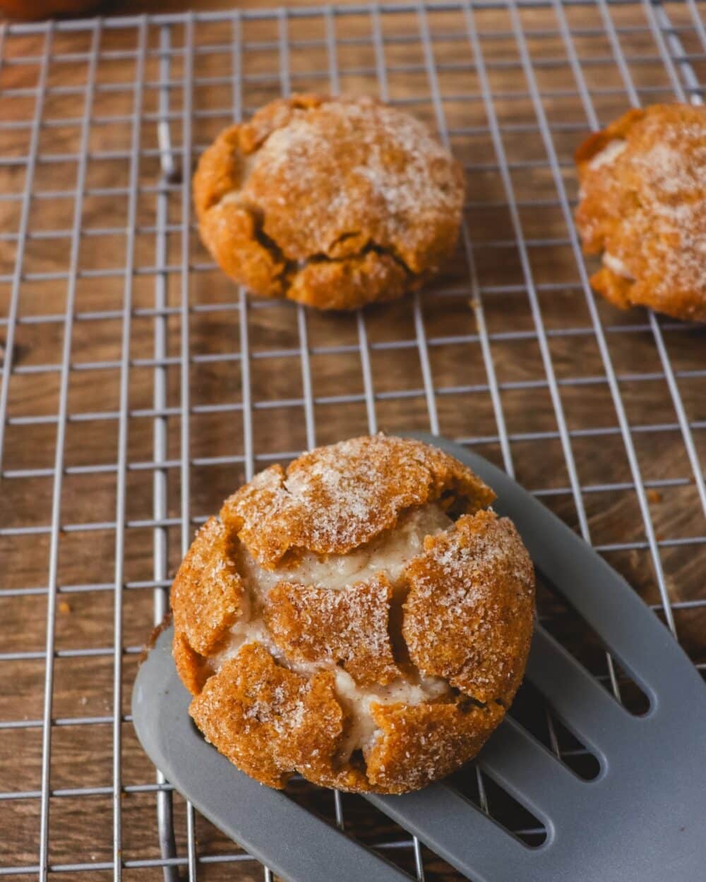 Keto Pumpkin Cheesecake Cookies -A new favorite for your holiday baking list this year. Spiced, sweet cheesecake gooey center wrapped in a warm, cozy pumpkin cookie.