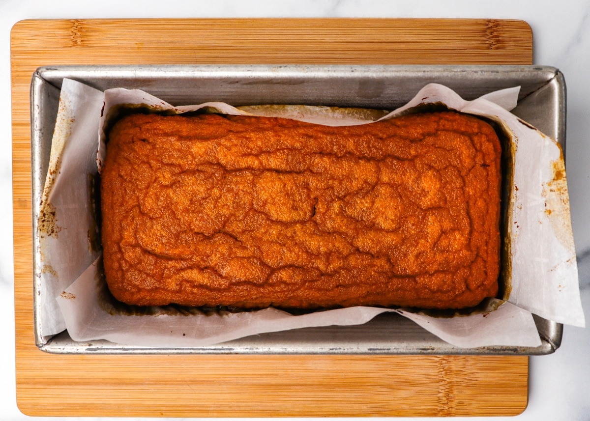 Overhead in bread pan and parchment paper fresh from oven