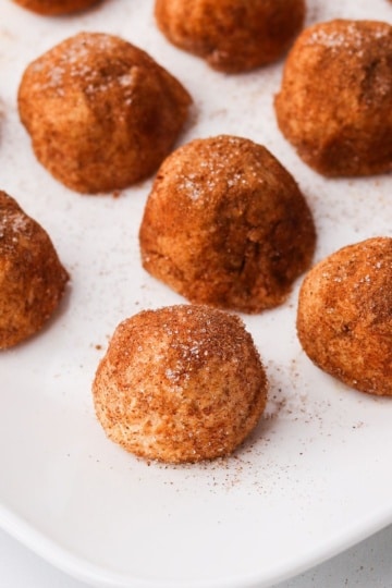 keto pumpkin pie cheesecake bites on a white plate