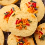 3 ingredient coconut flour sugar-free cookies with rainbow sprinkles on a cookie sheet