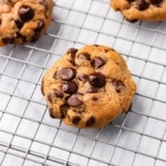 chocolate chip protein cookies on a wire cooling rack