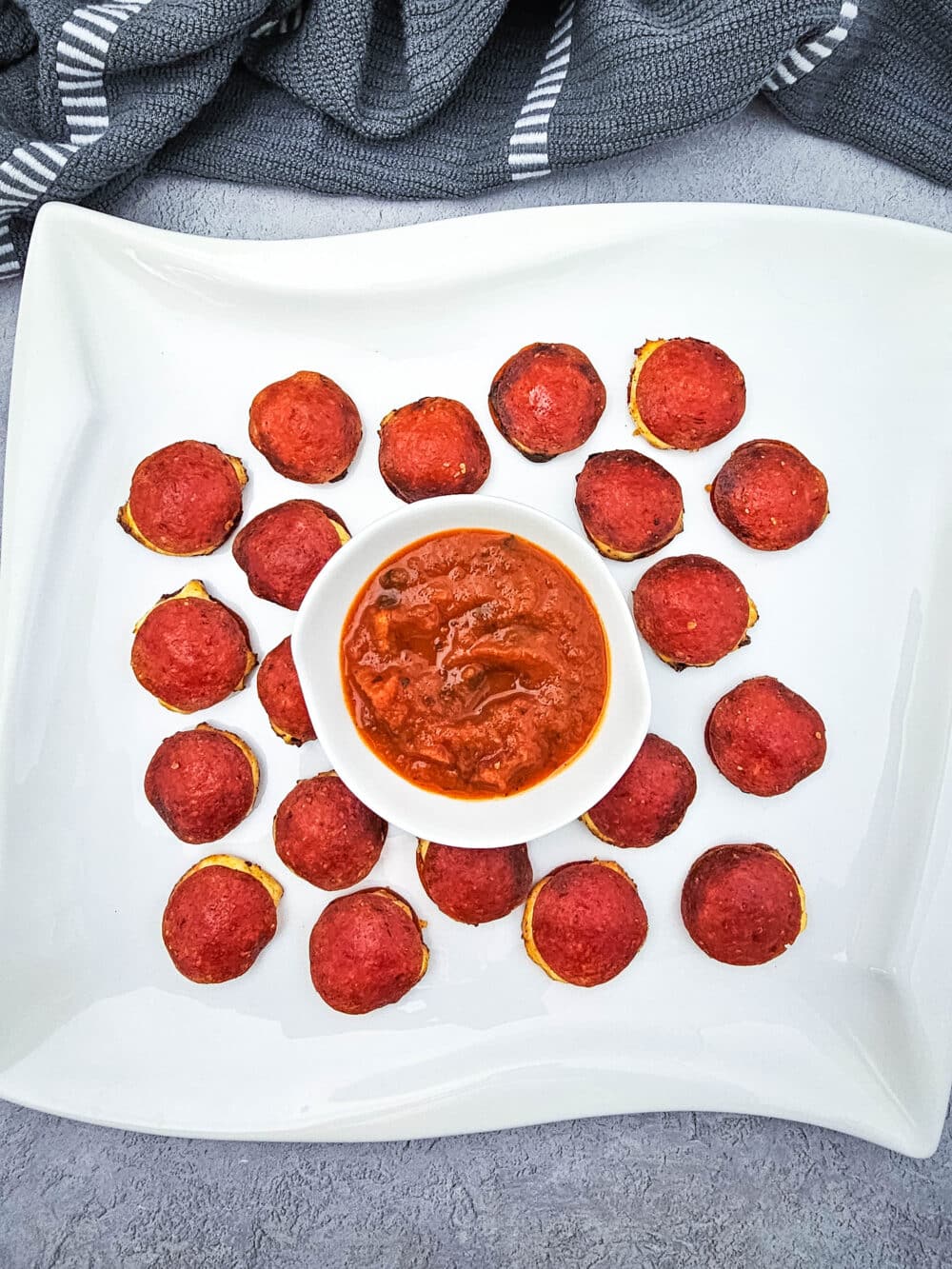 baked pepperoni bites with marinara sauce