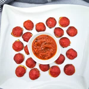 baked pepperoni bites with marinara sauce