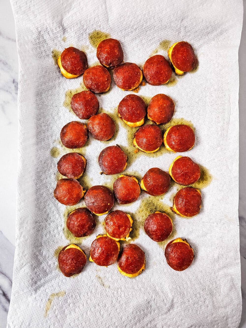 fresh baked Keto Pepperoni Cream Cheese Bites on a baking sheet