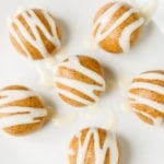 cinnamon roll energy bites drizzled with cream cheese icing overhead view