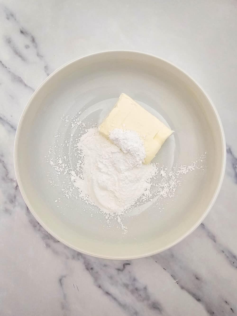 cream cheese and sweetener in a bowl