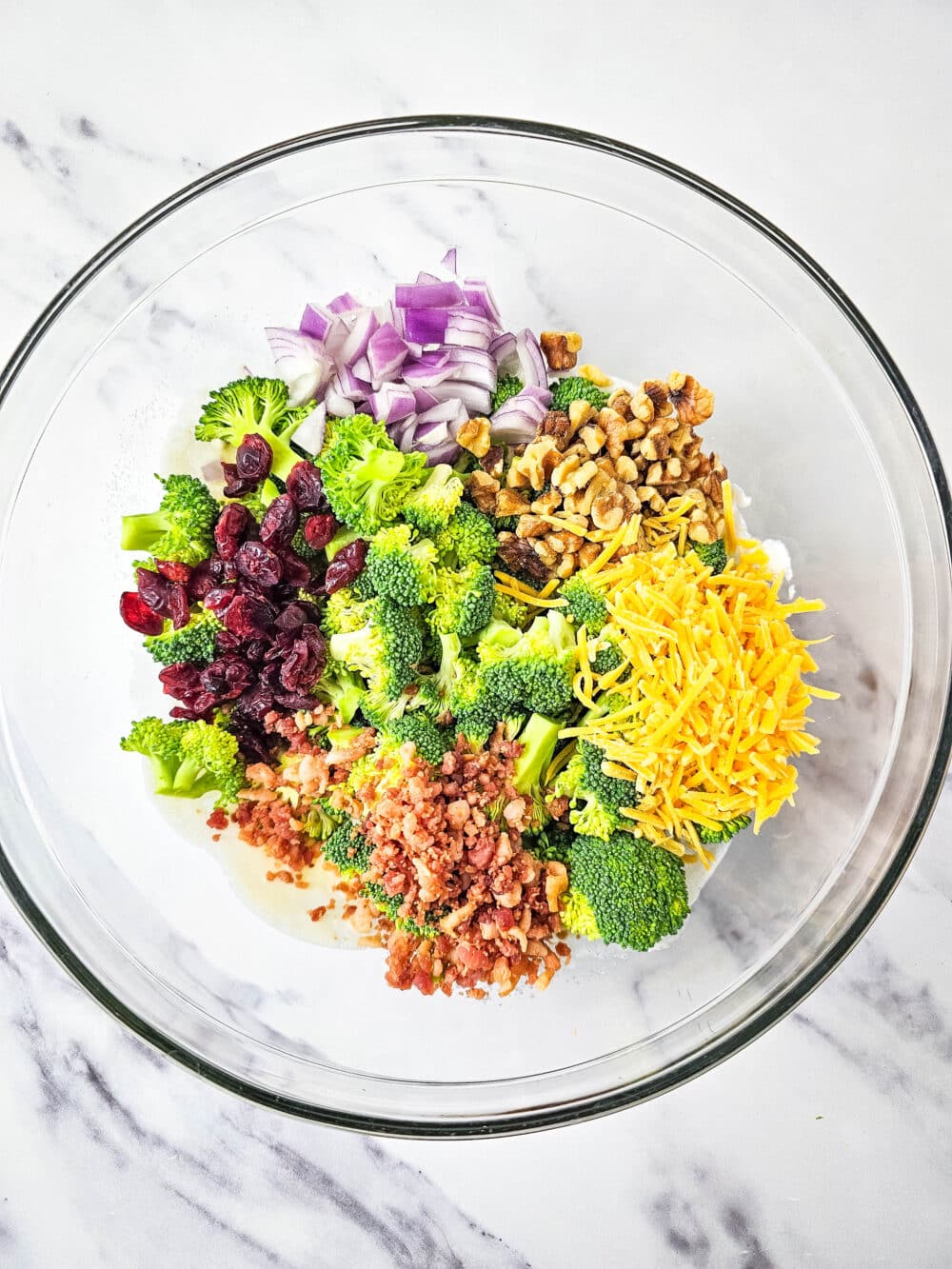 broccoli salad ingredients in a bowl