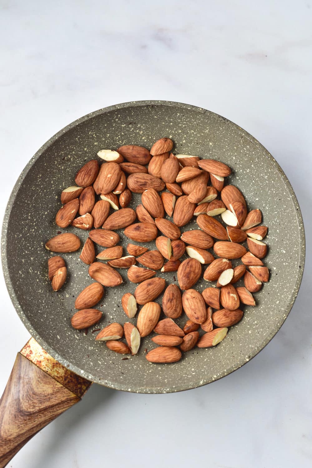 almonds toasting in skillet