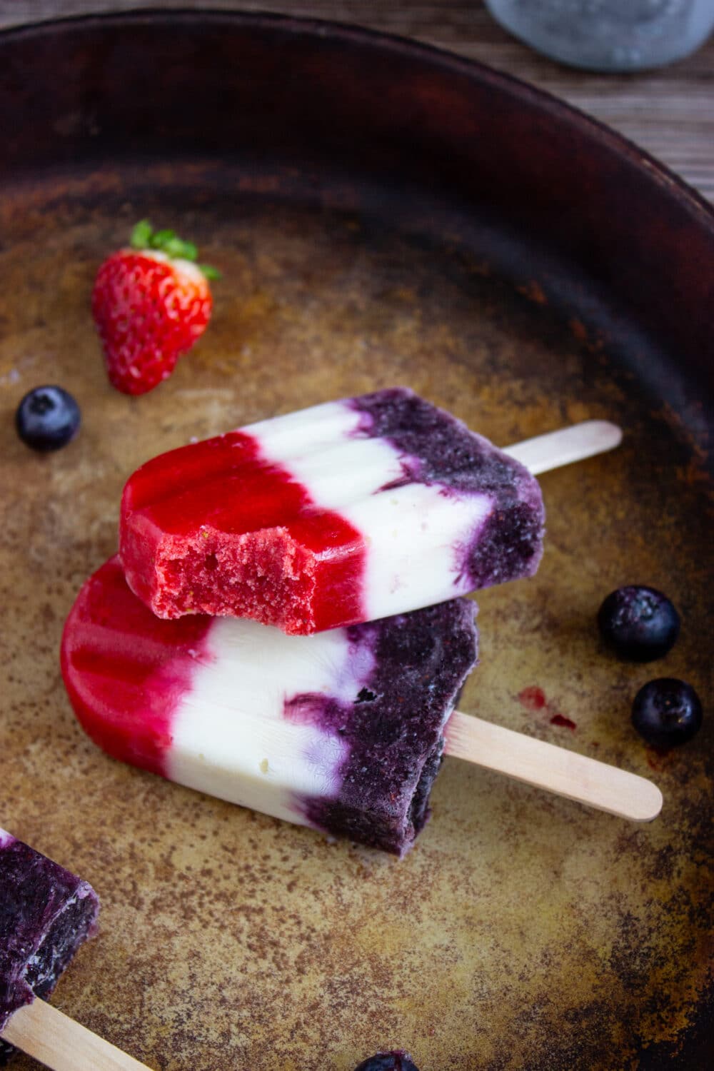 Keto Red White Blue Popsicles with bite taken out