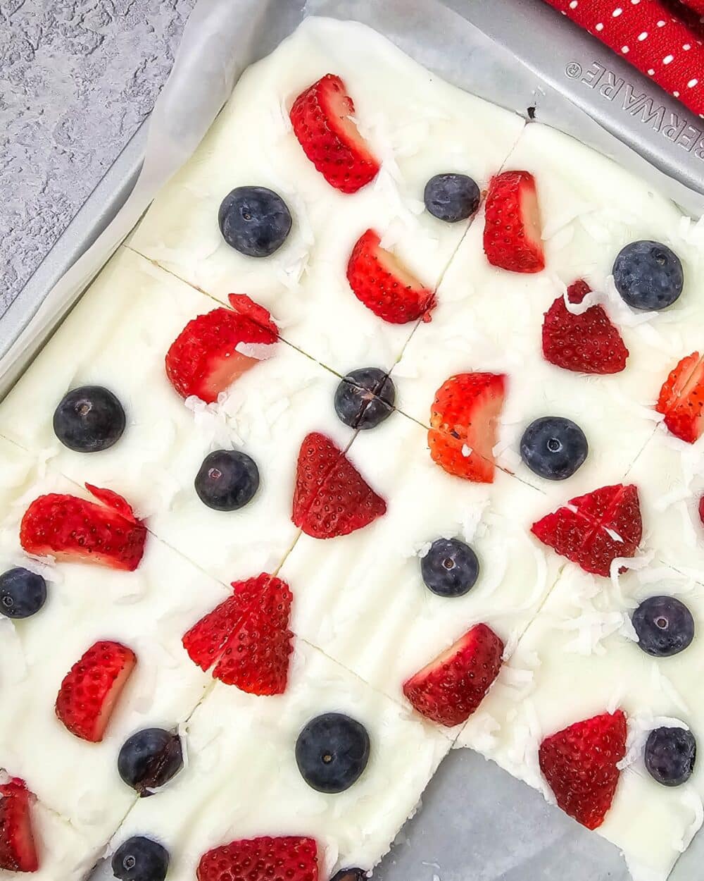 yogurt bark on a pan with piece taken out