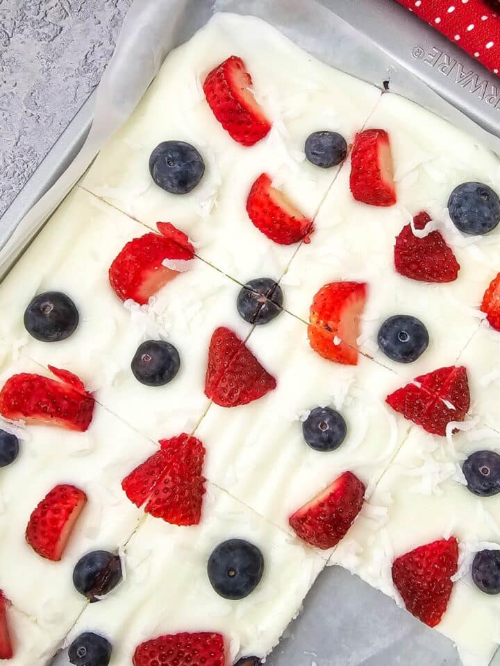 yogurt bark on a pan with piece taken out