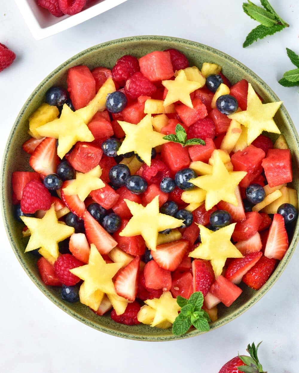 fruit salad in a bowl overhead shot