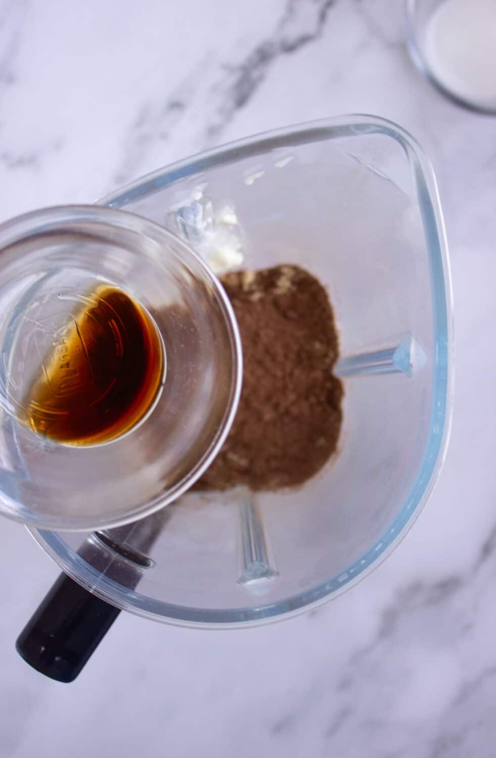 adding vanilla extract to a blender