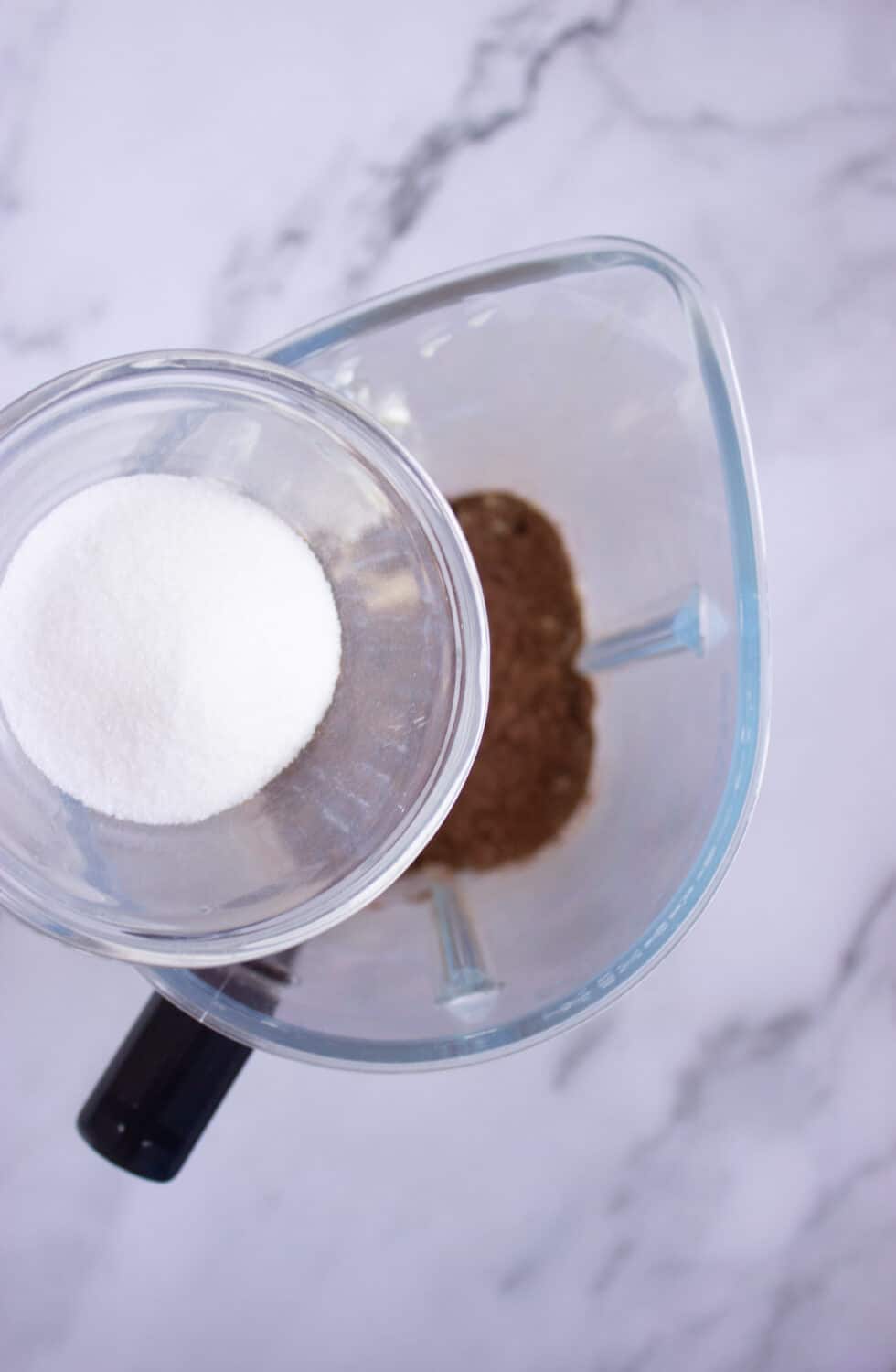 adding sweetener to a blender