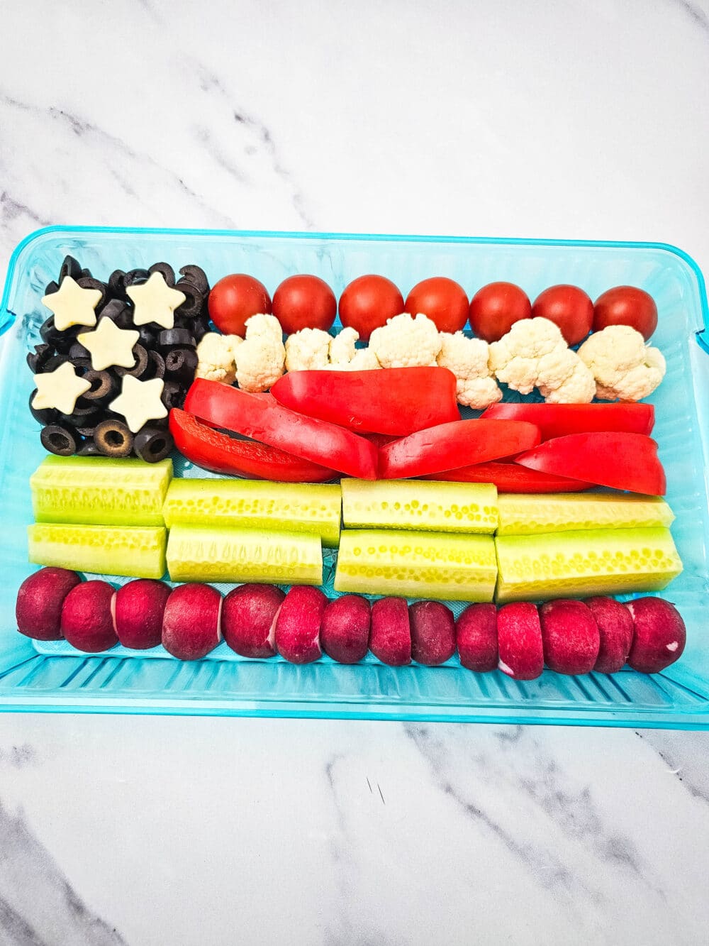 lining tray with vegetables to look like an American flag