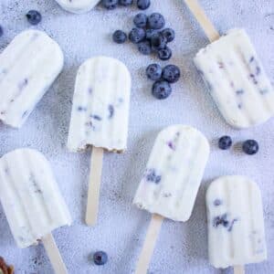 scattered Keto Protein Blueberry Cheesecake Popsicles