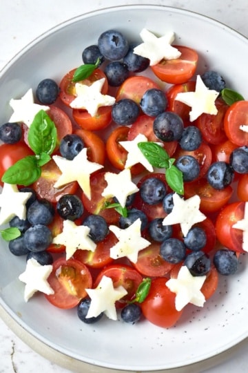 overhead view of Low Carb Fourth of July Caprese Salad in white bowl