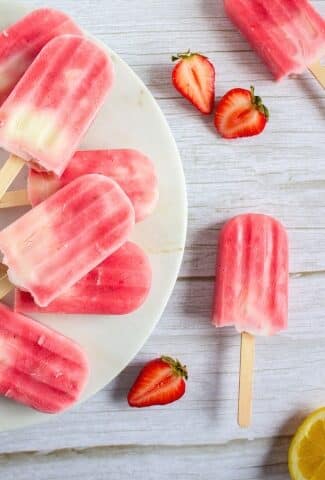Strawberry Lemonade Greek Yogurt Popsicles on a platter