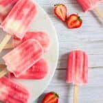 Strawberry Lemonade Greek Yogurt Popsicles on a platter