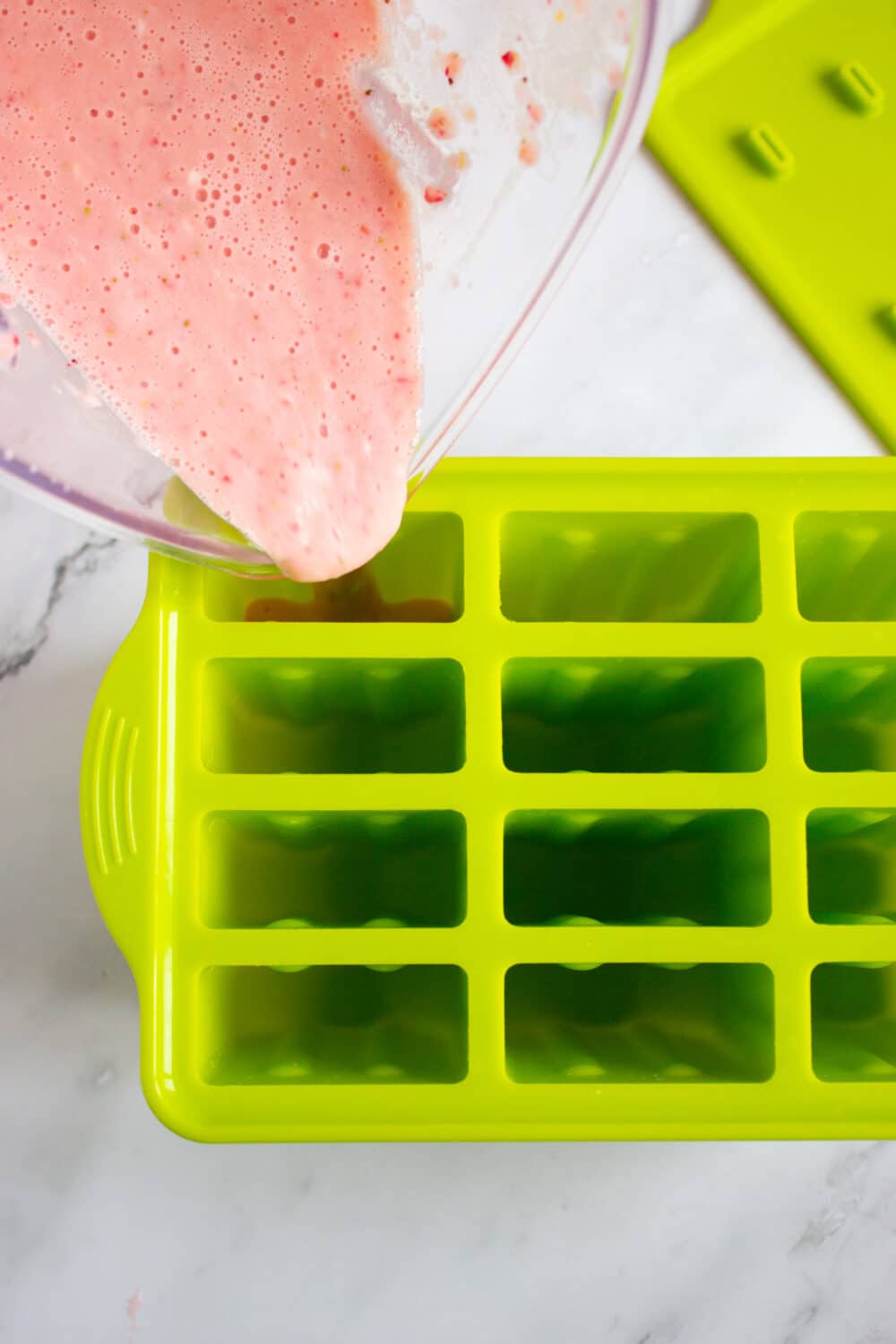 filling silicone popsicle molds