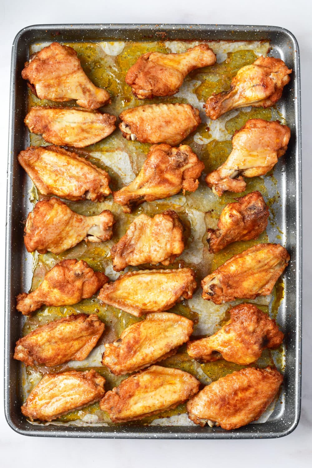 chicken wings ready to be flipped