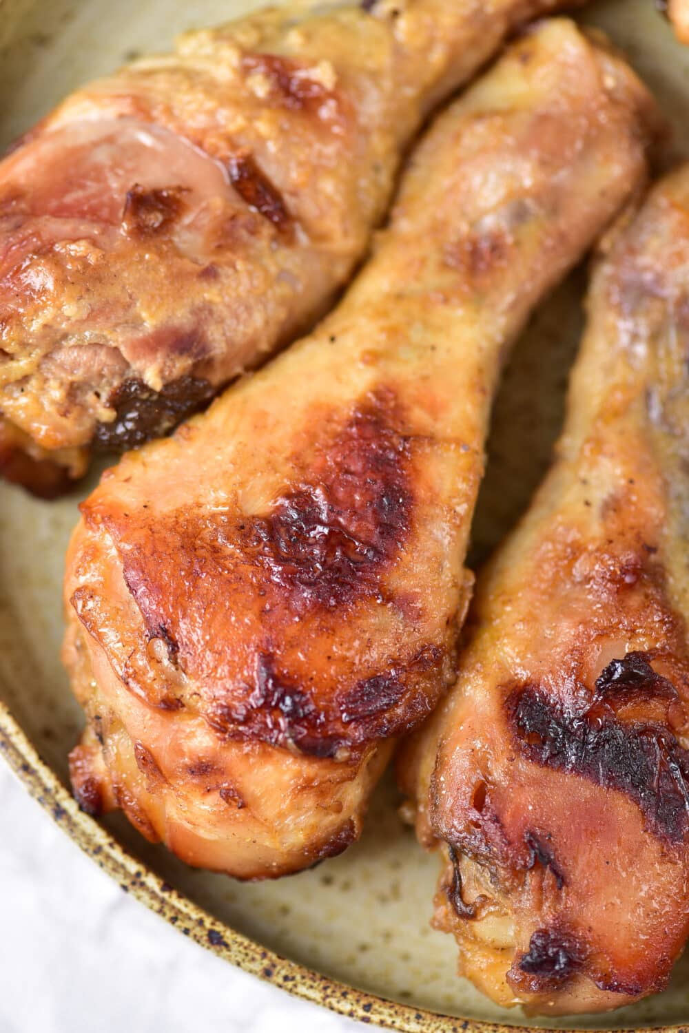 close up of Baked Honey Mustard Chicken Drumsticks