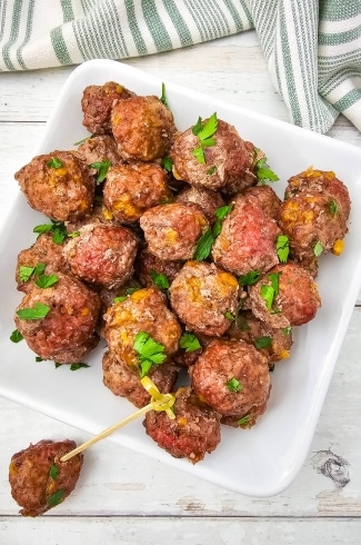 overhead view of Carnivore Meatballs with one bite shown on a toothpick