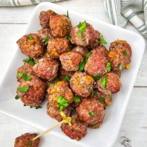 overhead view of Carnivore Meatballs with one bite shown on a toothpick