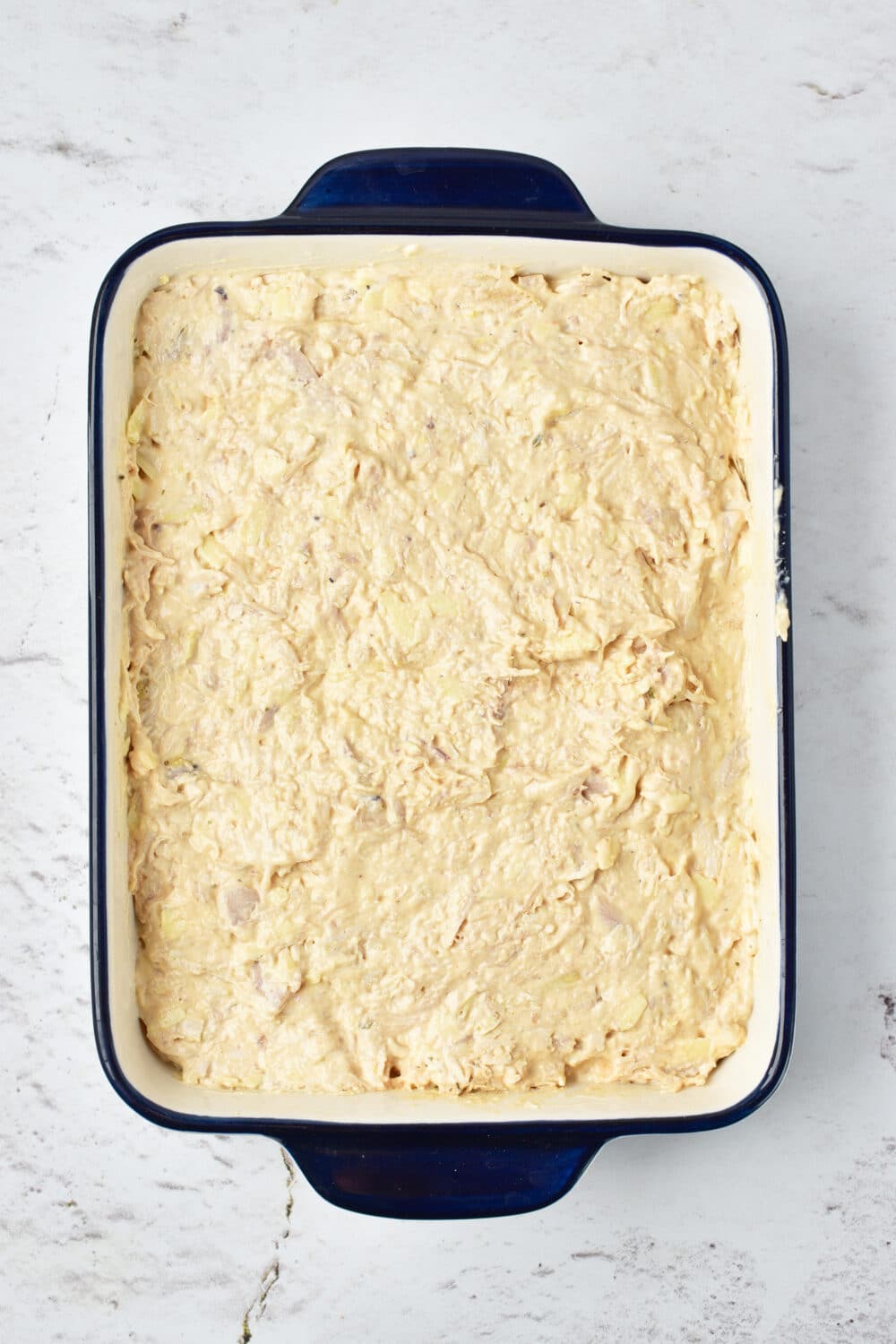 mixture added to a casserole dish ready for oven