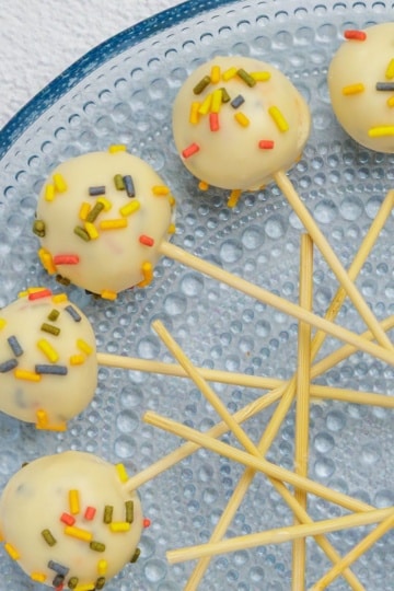 keto cake pops on a blue plate overhead shot