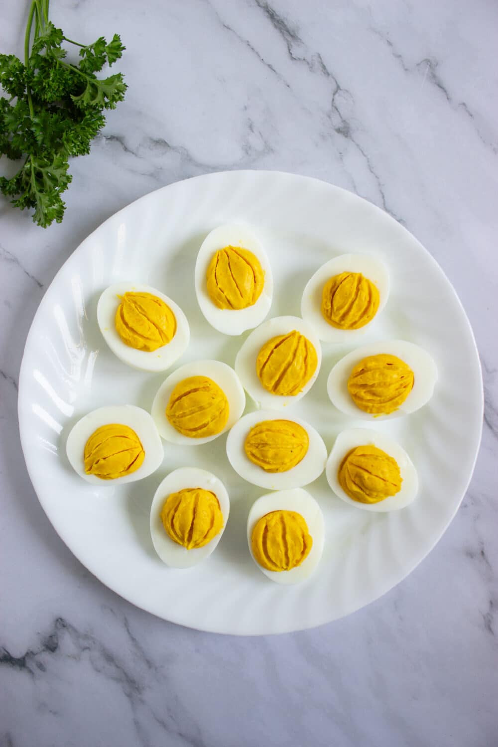 overhead view deviled eggs ready to garnish