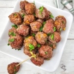 overhead view of Carnivore Meatballs with one bite shown on a toothpick