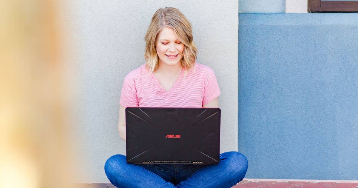 portrait of Olivia Wyles on her laptop