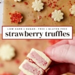 Overhead flat-lay of keto strawberry truffles in two varieties: white chocolate pieces and freeze dried strawberry pieces scattered on a parchment paper.